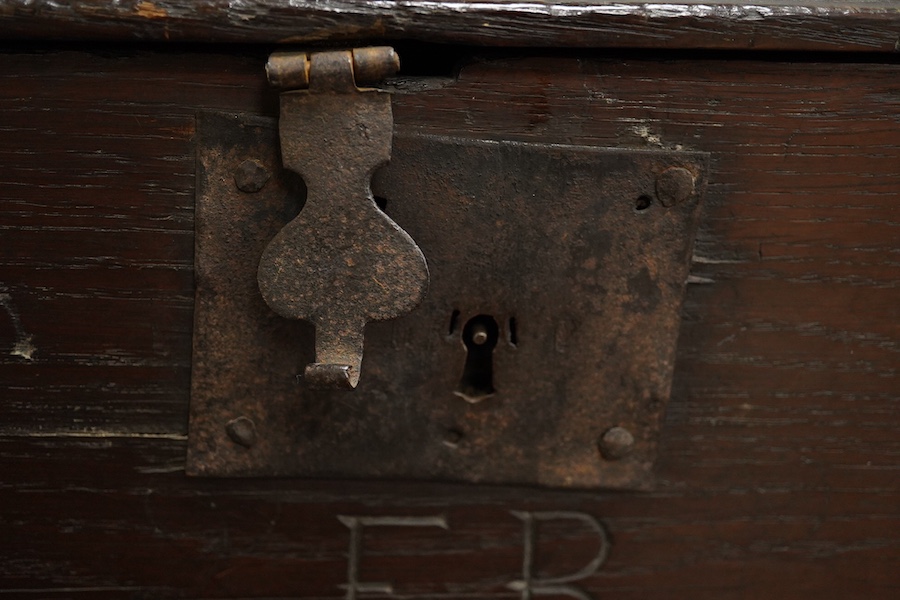 A George I oak bible box, circa 1716, carved with initials ‘EB’ and date, 50cm wide. Condition - poor to fair